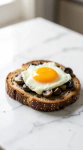 Garlic Mushroom, Goat Cheese & Fried Egg Toast Sandwich