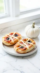 Mini English Muffin Mummy Pizzas